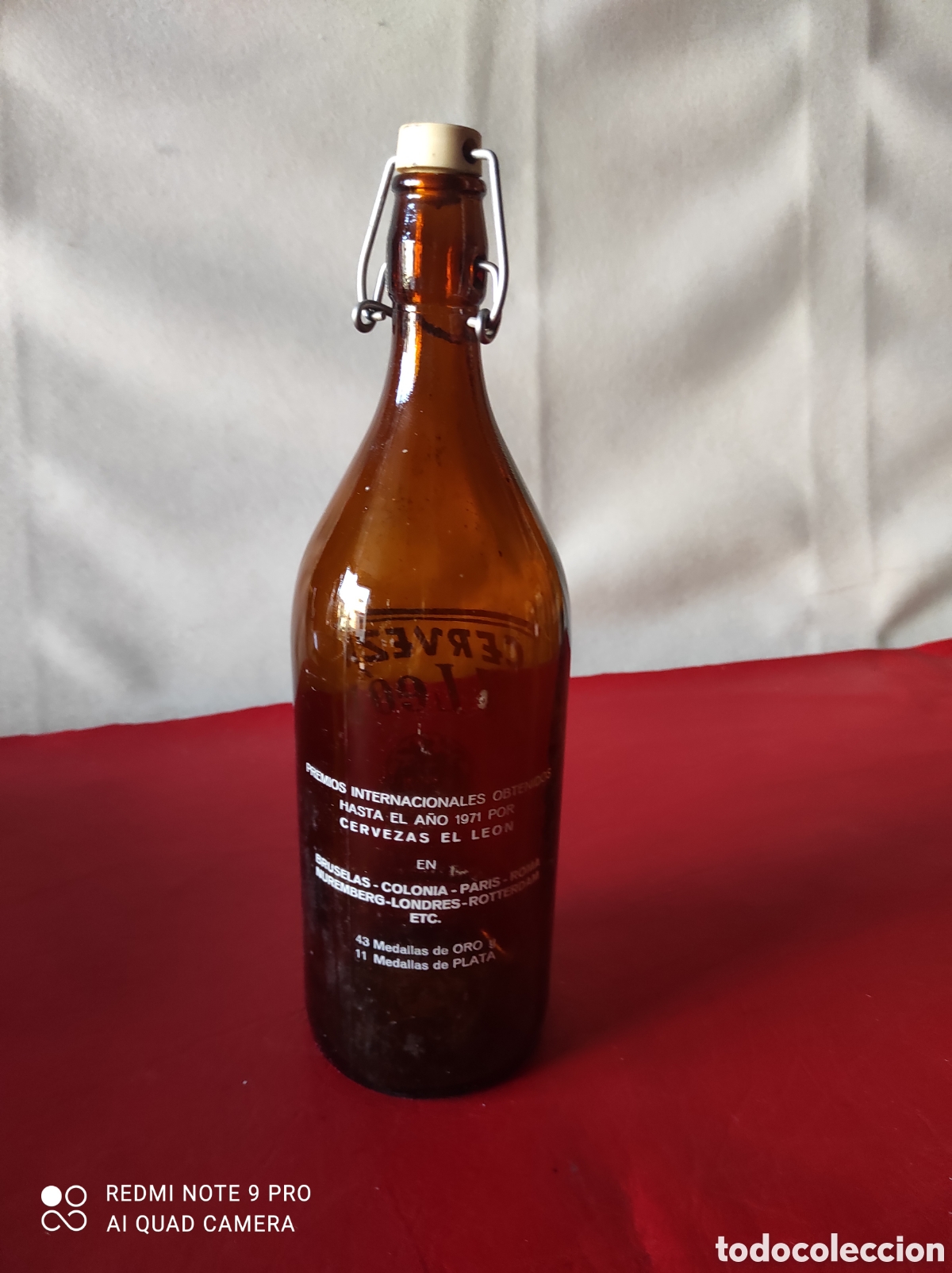 Coleccionismo de cervezas: Antigua botella de cerveza el le&oacute;n 1LT. - Foto 2