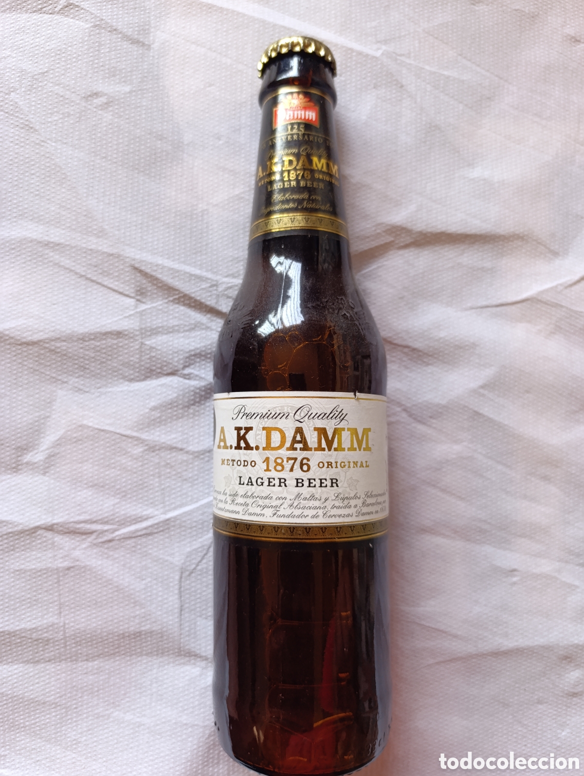Coleccionismo de cervezas: Botella cerveza AK DAMM 2006 - Foto 1