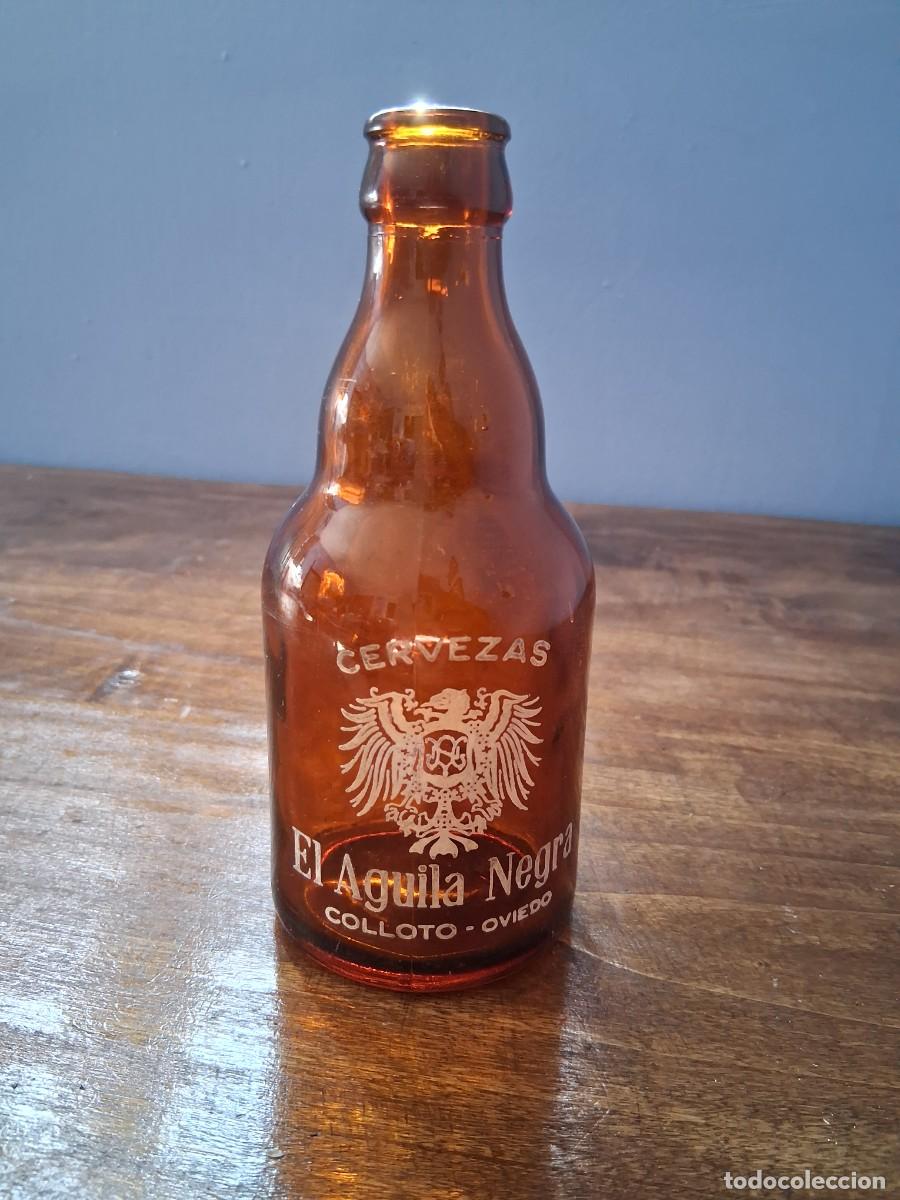Coleccionismo de cervezas: Botella cerveza El aguila negra Colloto Oviedo Asturias