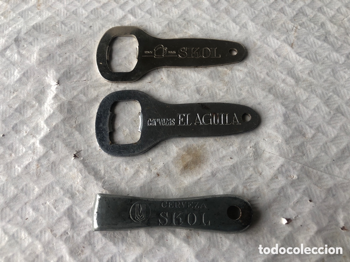 Collectionnisme de bi&egrave;res: Lote antiguos abrebotellas / abridores cerveza SKOL / el AGUILA