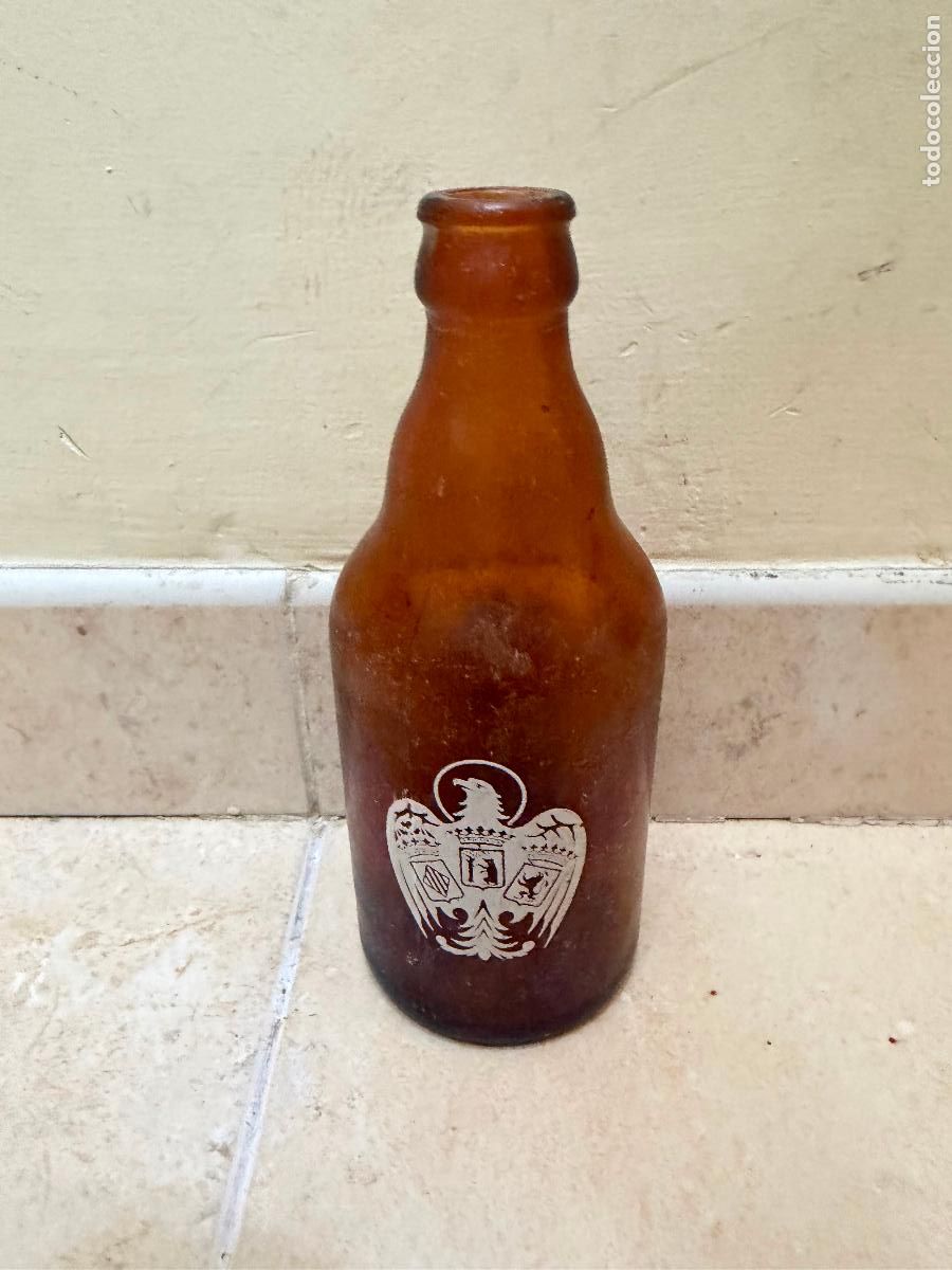 Coleccionismo de cervezas: Botella de cerveza el &aacute;guila con error - Foto 2