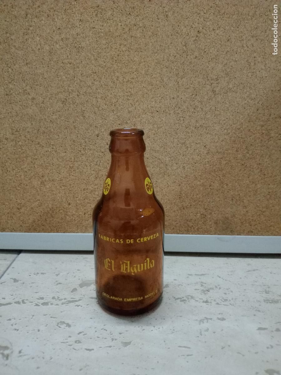 Sammeln von Brauereiartikeln: BOTELLA BOTELLIN CERVEZA AGUILA 20 CL - MADRID A&Ntilde;OS 70 - 80 - BUEN ESTADO PINTURA