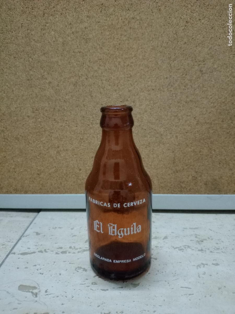 Sammeln von Brauereiartikeln: BOTELLA BOTELLIN CERVEZA AGUILA 20 CL - MADRID A&Ntilde;OS 70 - 80 - BUEN ESTADO PINTURA