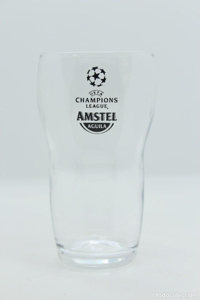 Colecionismo de cervejas: vaso cerveza AMSTEL AGUILA UEFA CHAMPIONS LEAGUE beer bier birra SOY.YO