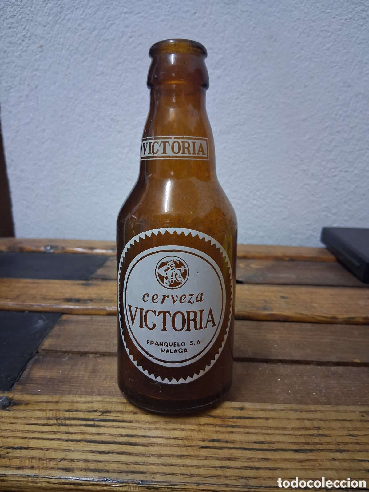 Coleccionismo de cervezas: Botella de cerveza Victoria Málaga quinto 20 cl
