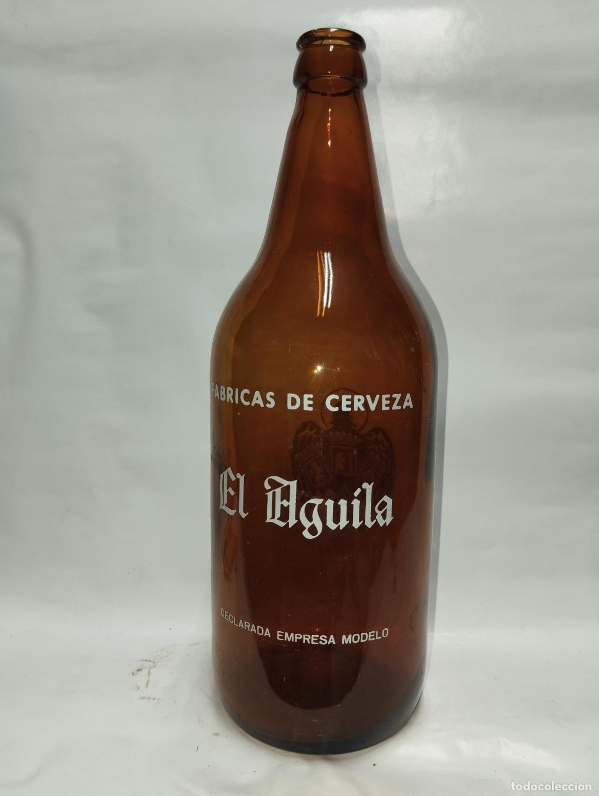 Coleccionismo de cervezas: BOTELLA DE CERVEZA EL &Aacute;GUILA DE LITRO - Foto 1