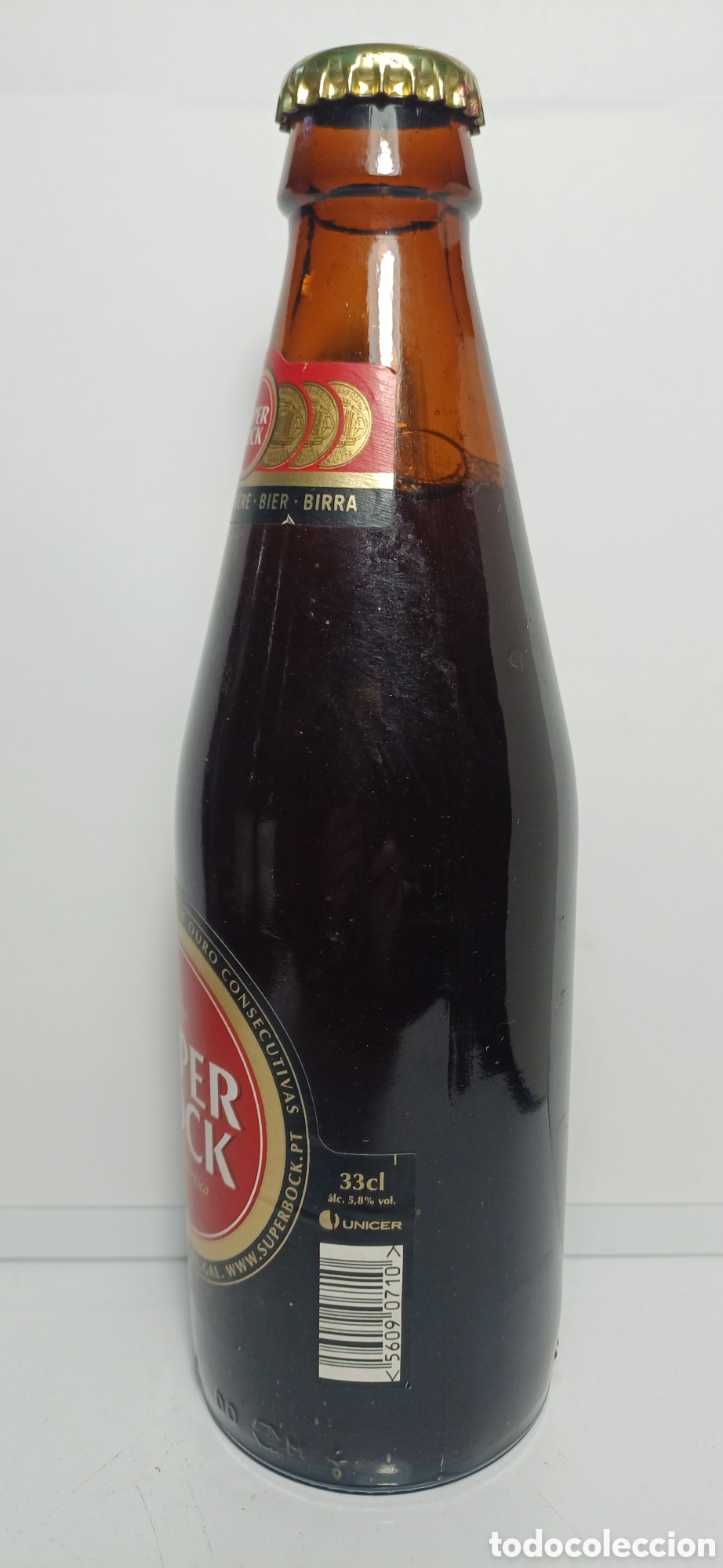 Coleccionismo de cervezas: Botella cerveza Super Bock 33cl 2002 LLENA