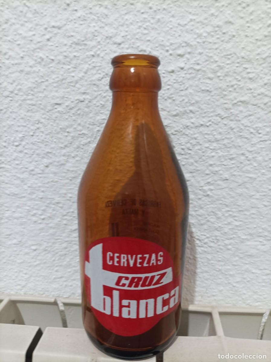 Coleccionismo de cervezas: Botella antigua de cerveza cruz blanca