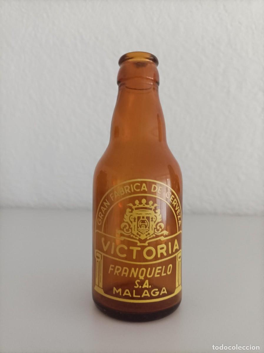 Coleccionismo de cervezas: Antiguo botellin de cervezas Victoria-Malaga-