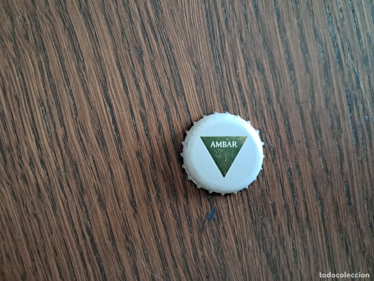 Coleccionismo de cervezas: chapa tap&oacute;n corona de cerveza, ambar, blanca.