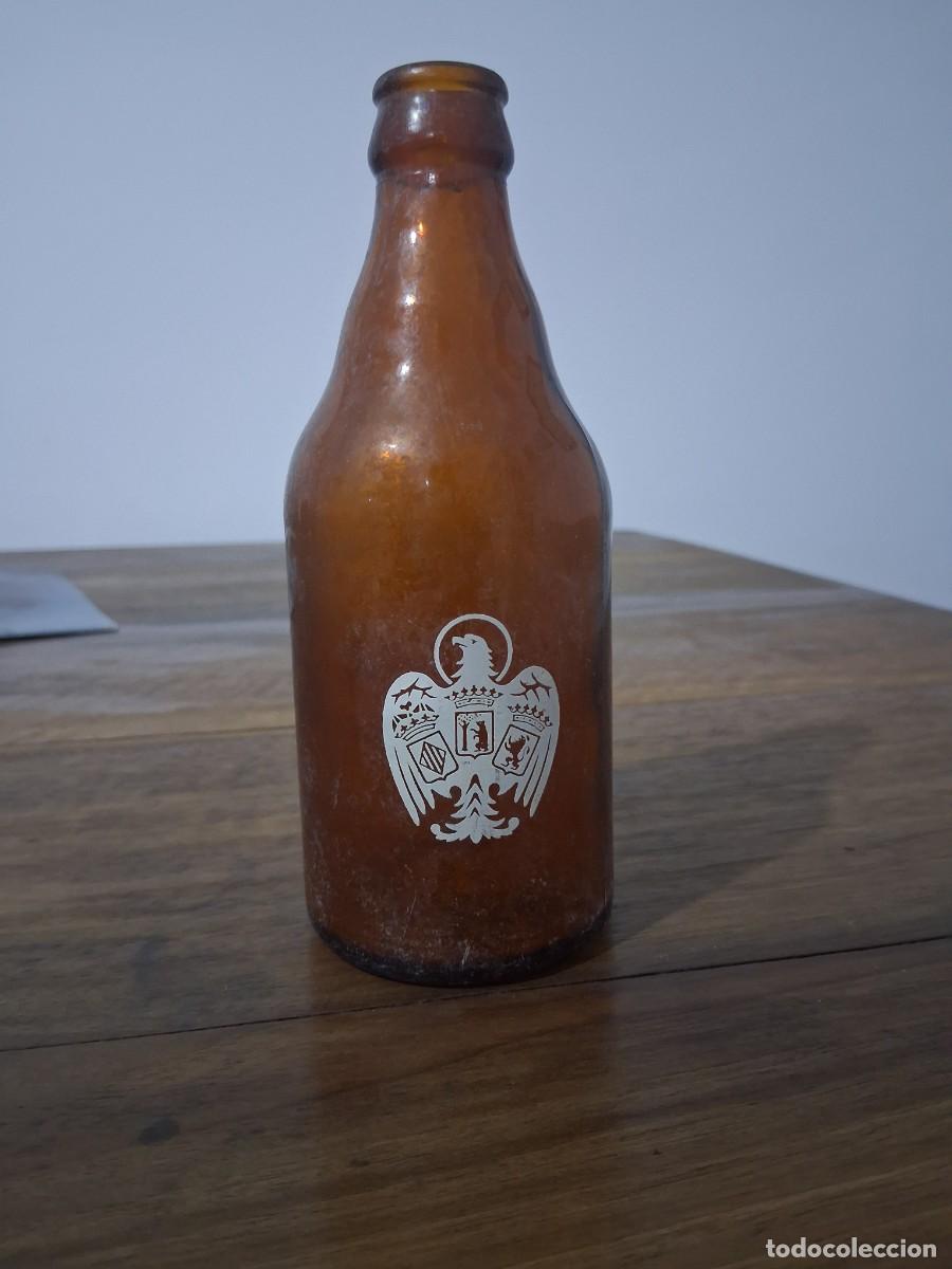 Coleccionismo de cervezas: Botella de cerveza El aguila tercio - Foto 2