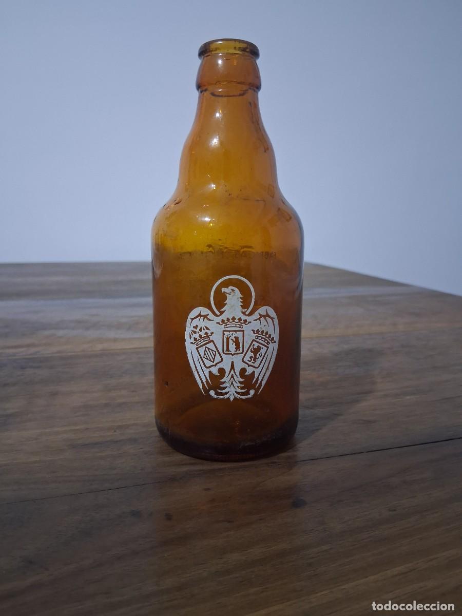 Coleccionismo de cervezas: Botella de cerveza El aguila tercio Valencia Madrid C&oacute;rdoba