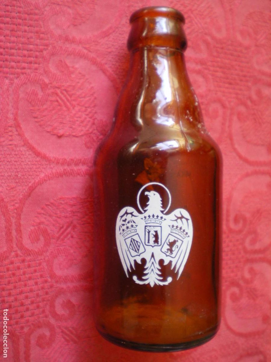 Coleccionismo de cervezas: ANTIGUA BOTELLA CERVEZAS EL &Aacute;GUILA.