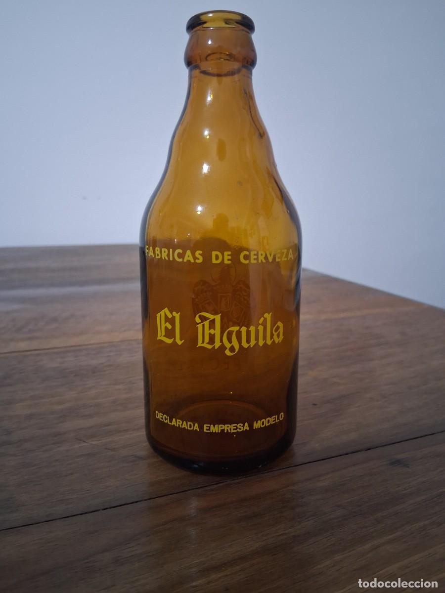 Coleccionismo de cervezas: Botella de cerveza El aguila tercio especial sin collar&iacute;n