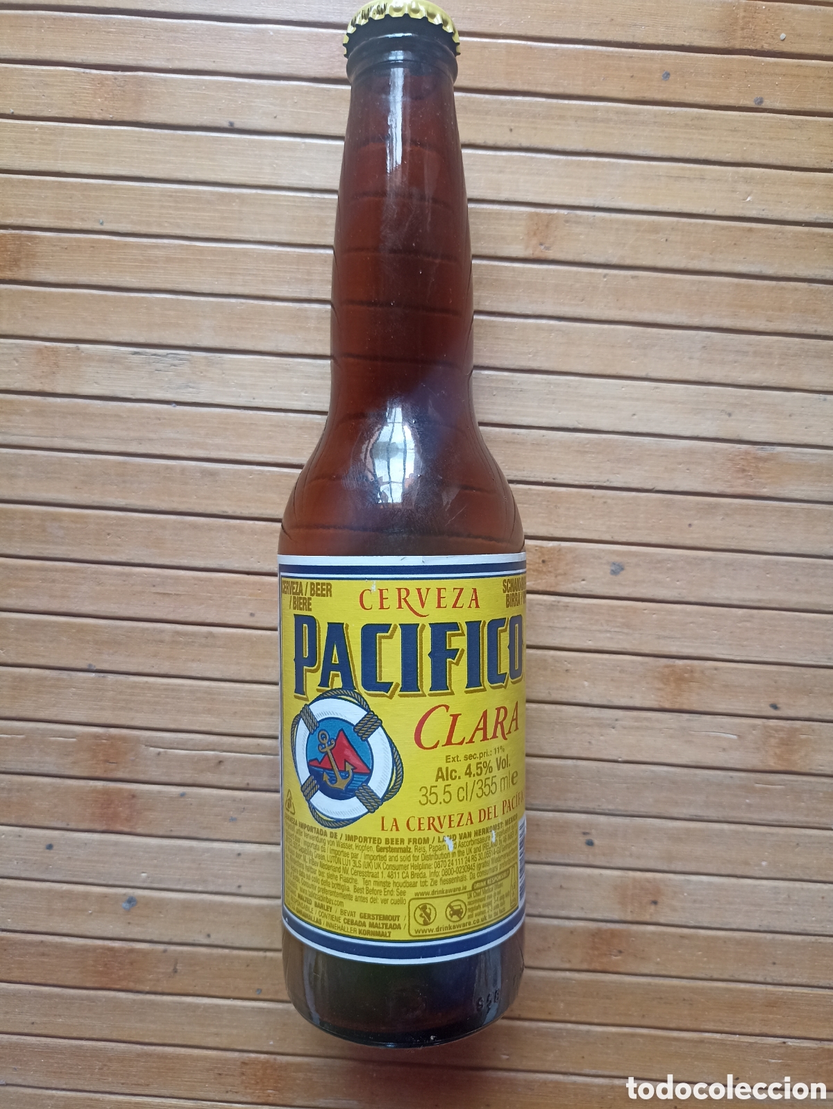 Coleccionismo de cervezas: Botella cerveza Pac&iacute;fico M&eacute;xico vac&iacute;a con chapa 355 ml