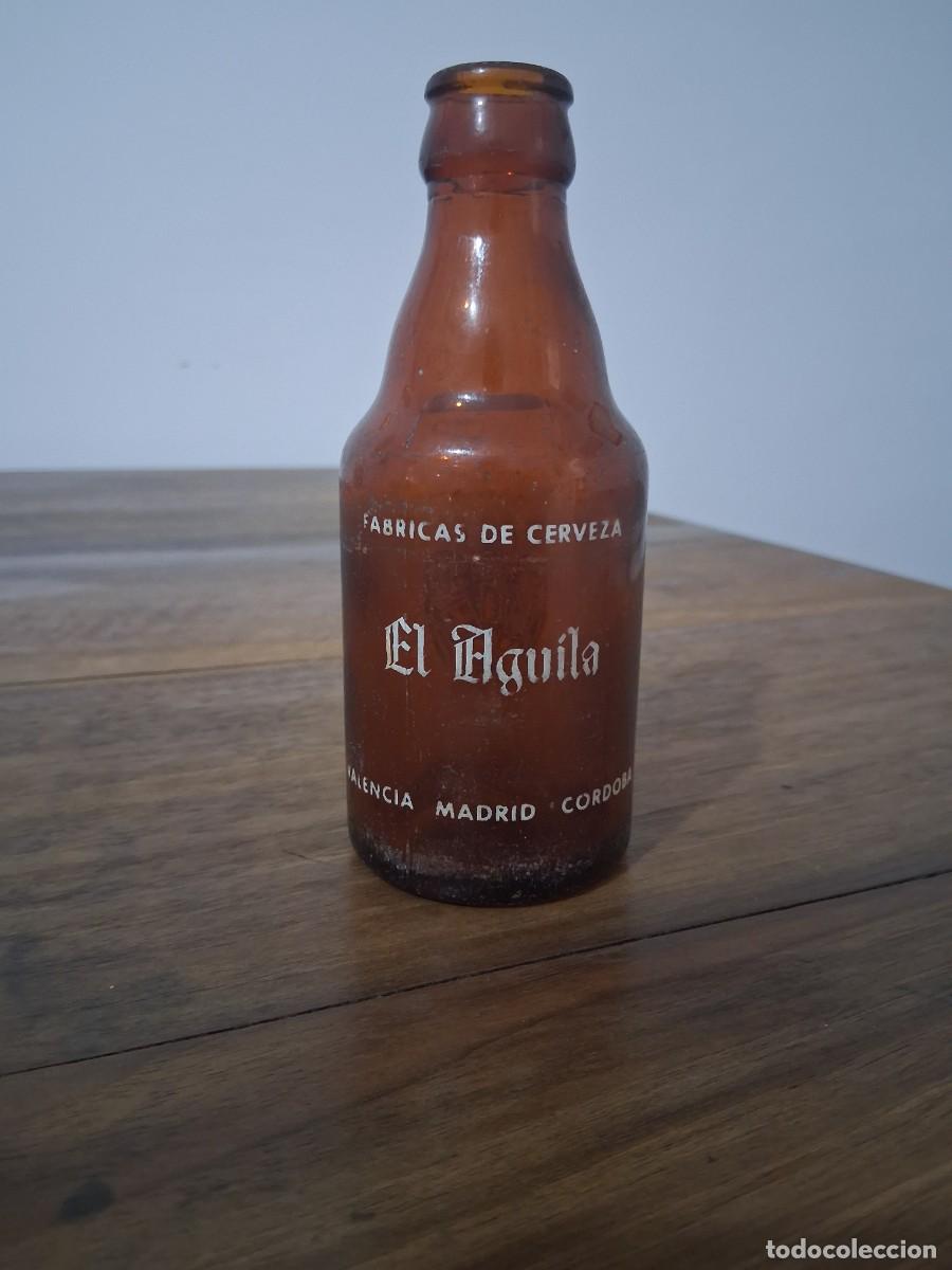 Coleccionismo de cervezas: Botella de 20 cl cerveza EL AGUILA quinto del a&ntilde;o 1967