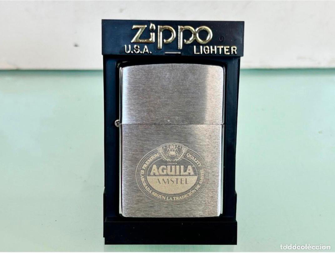 Coleccionismo de cervezas: NUEVO!! ZIPPO CERVEZA AGUILA AMSTEL- B-XV 1999-MECHERO GASOLINA ENCENDEDOR-