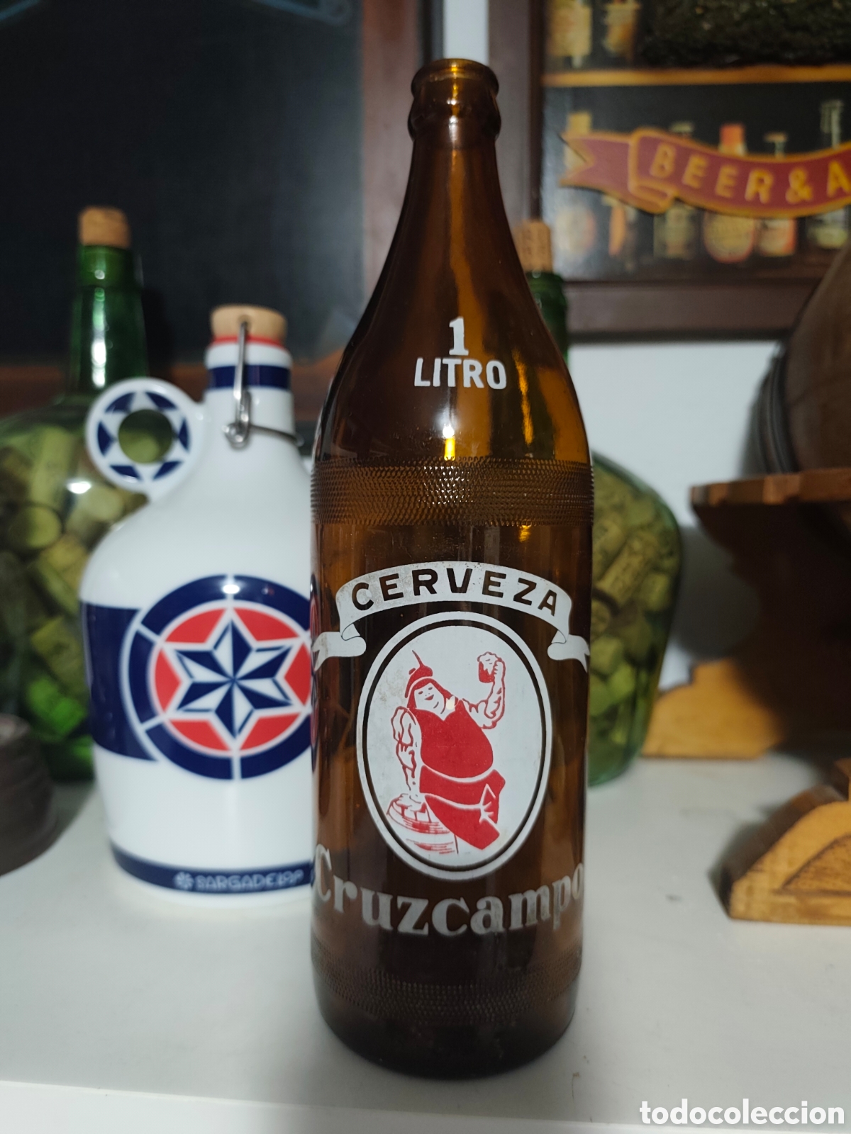 Coleccionismo de cervezas: Botella cerveza Cruzcampo litro vacia