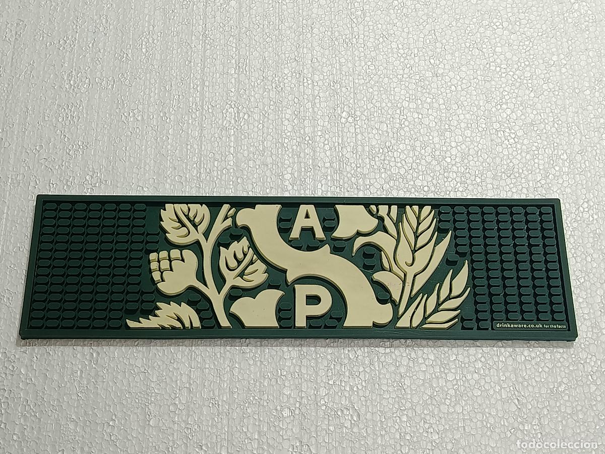 Coleccionismo de cervezas: ALFOMBRA DE GOMA CERVEZA STAROPRAMEN. 37CM X 10CM APROXIMADAMENTE. POCO USO.