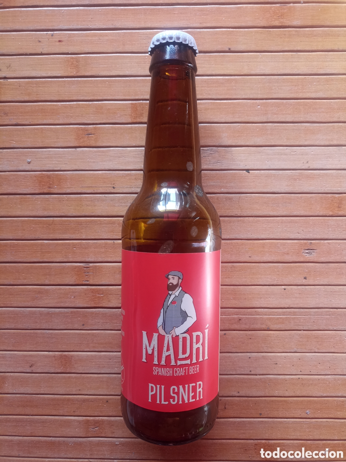 Coleccionismo de cervezas: Botella cerveza Madr&iacute; Spanish Craft Beer Pilsner vac&iacute;a con chapa 330 ml
