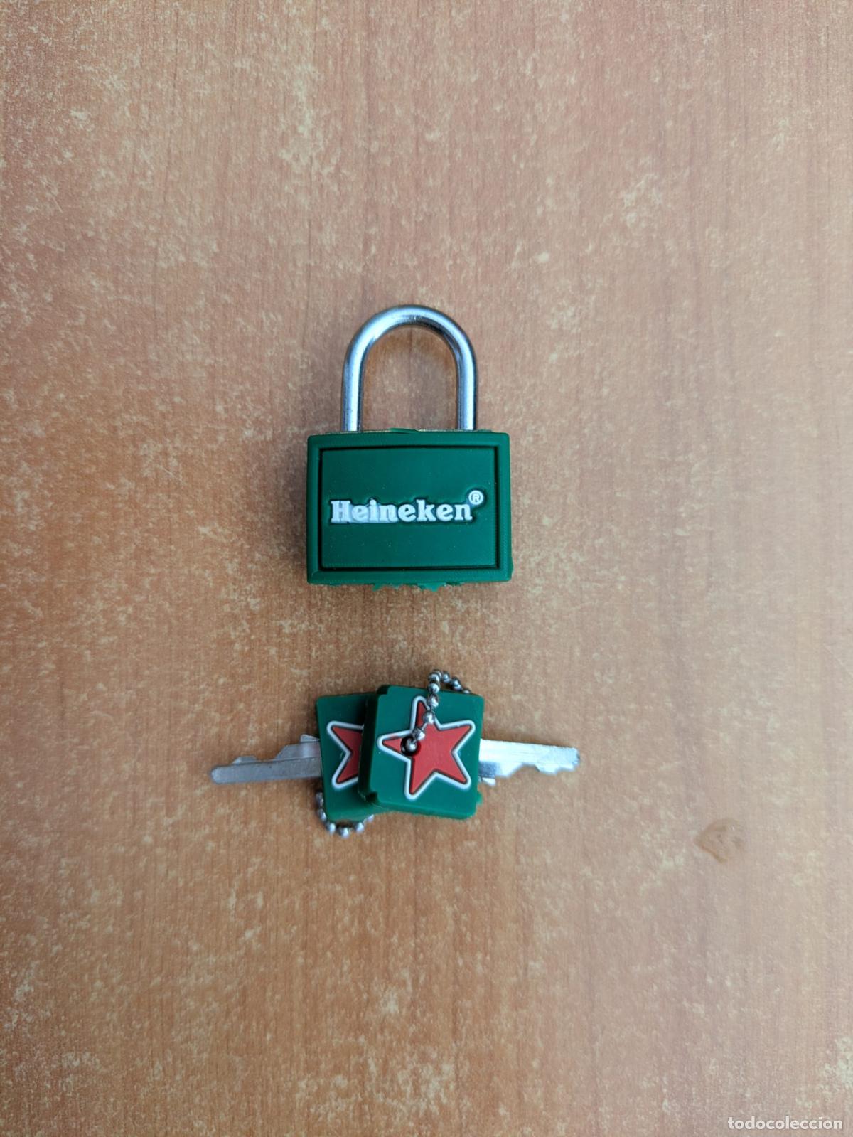 Coleccionismo de cervezas: Candado Cerveza Heineken. Merchandising Heineken Beer. En su bolsa.