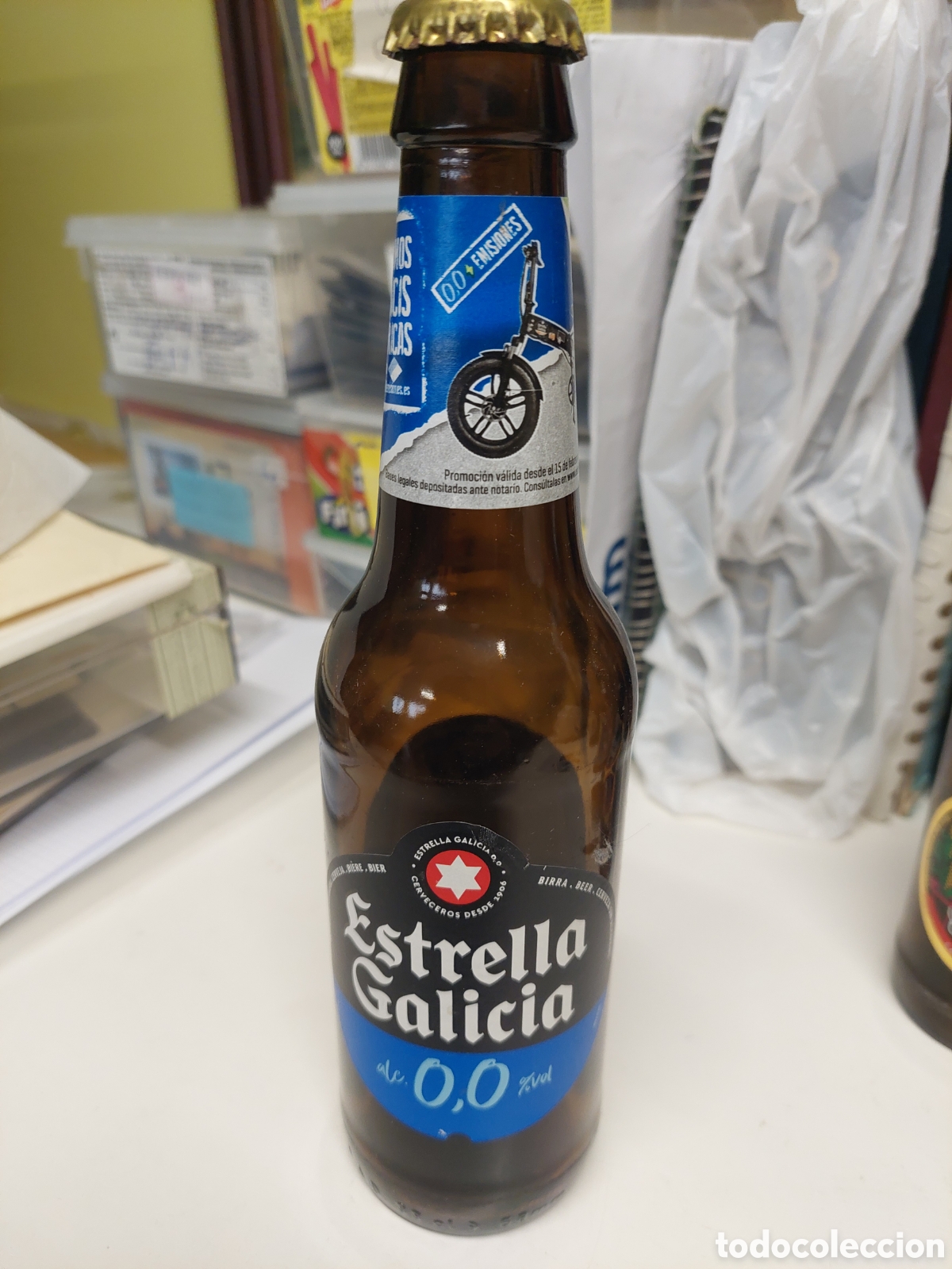 Coleccionismo de cervezas: O.O ESTRELLA GALICIA CERVEZA 33 CL SORTEO 150 BICIS ELETRICAS XACOBEO 21/22 vacia