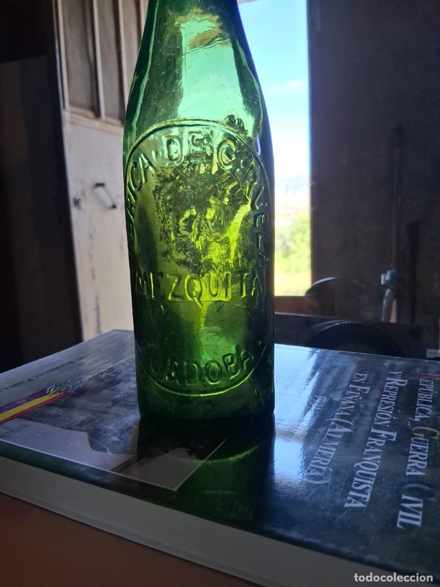 Coleccionismo de cervezas: Antigua botella de cerveza LA MEZQUITA DE CORDOBA a&ntilde;o 1920 tercio