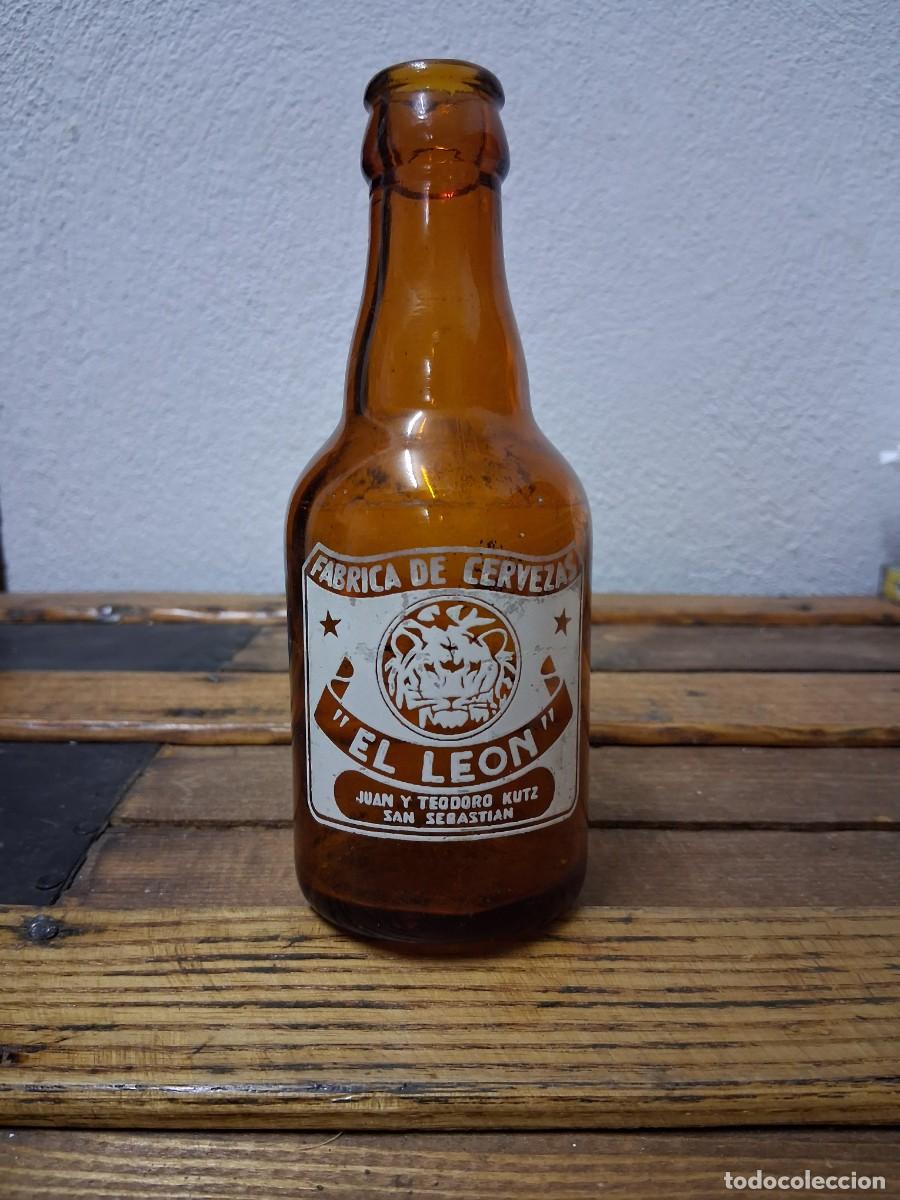 Coleccionismo de cervezas: Botella de cerveza El le&oacute;n quinto 20 cl a&ntilde;o 1960 aproximadamente