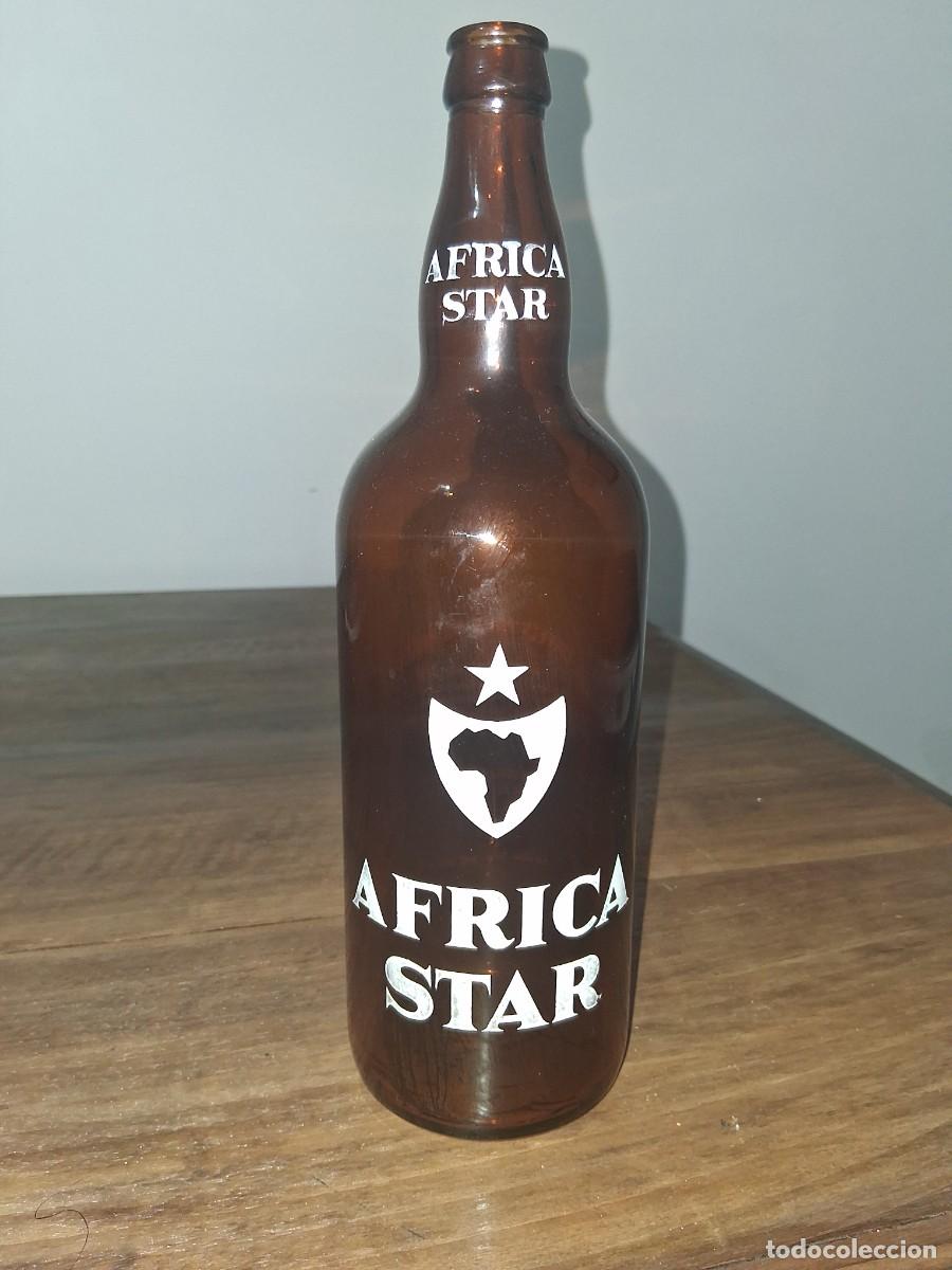 Coleccionismo de cervezas: Botella de 1 litro del a&ntilde;o 1966 cerveza &Aacute;frica Star Ceuta