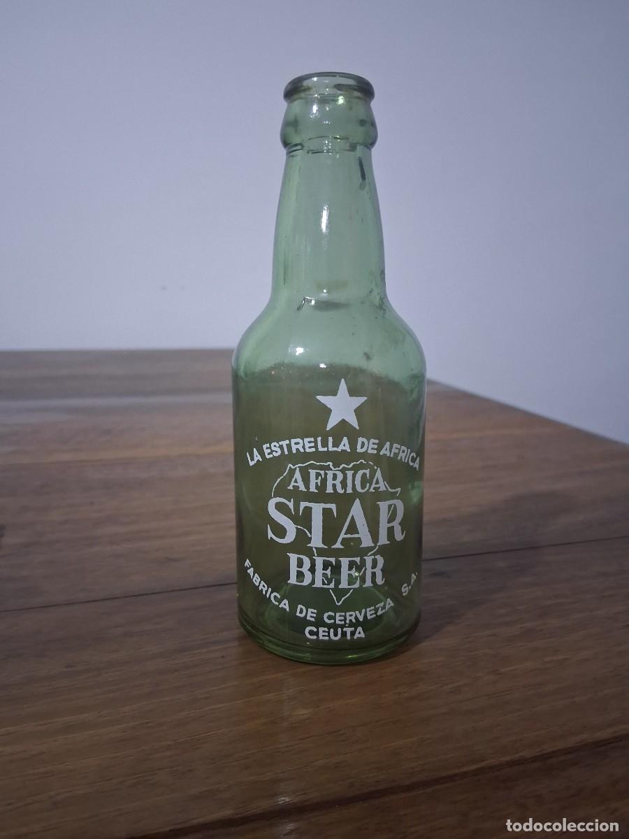 Coleccionismo de cervezas: Botella de cerveza &Aacute;frica Star Ceuta tercio cristal verde