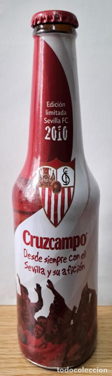 Coleccionismo de cervezas: BOTELLIN DE CERVEZA DE EDICION LIMITADA PRECINTADO DEL SEVILLA FUTBOL CLUB 2010. BOTELLIN-82