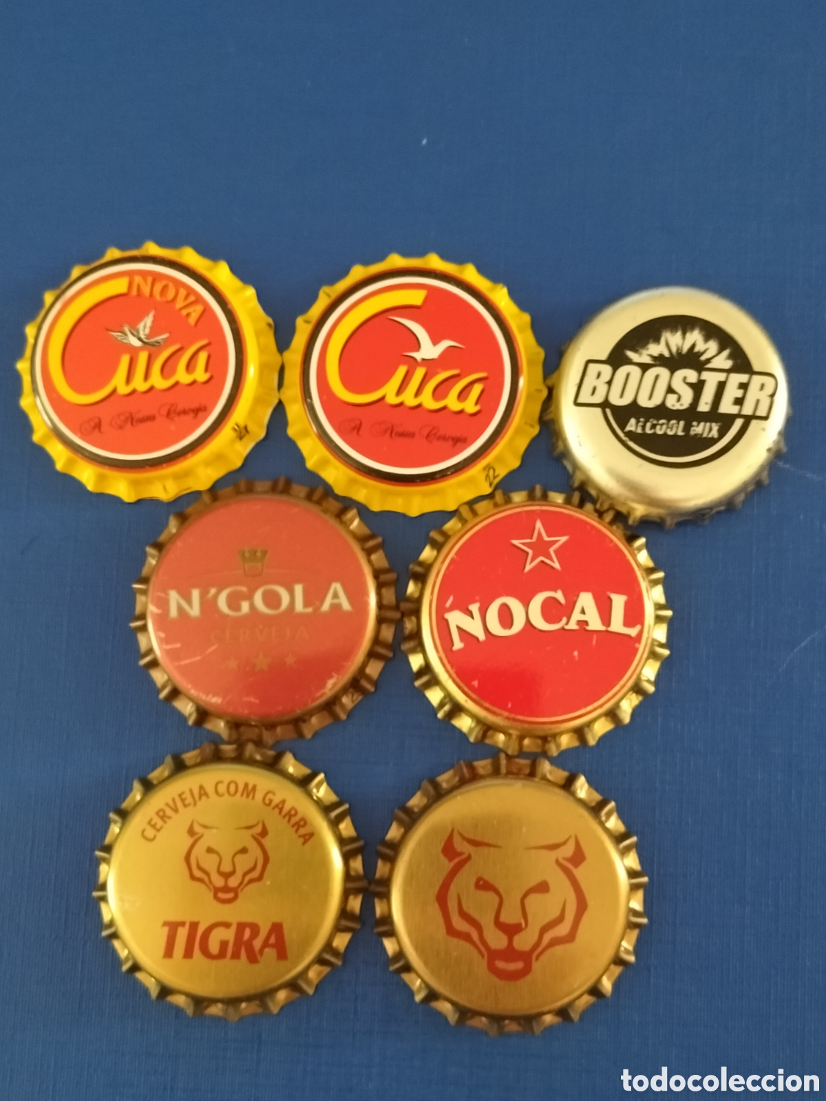 Coleccionismo de cervezas: LOTE 7 CHAPAS TAPON CORONA CERVEZA ANGOLA - NUEVAS SIN USAR