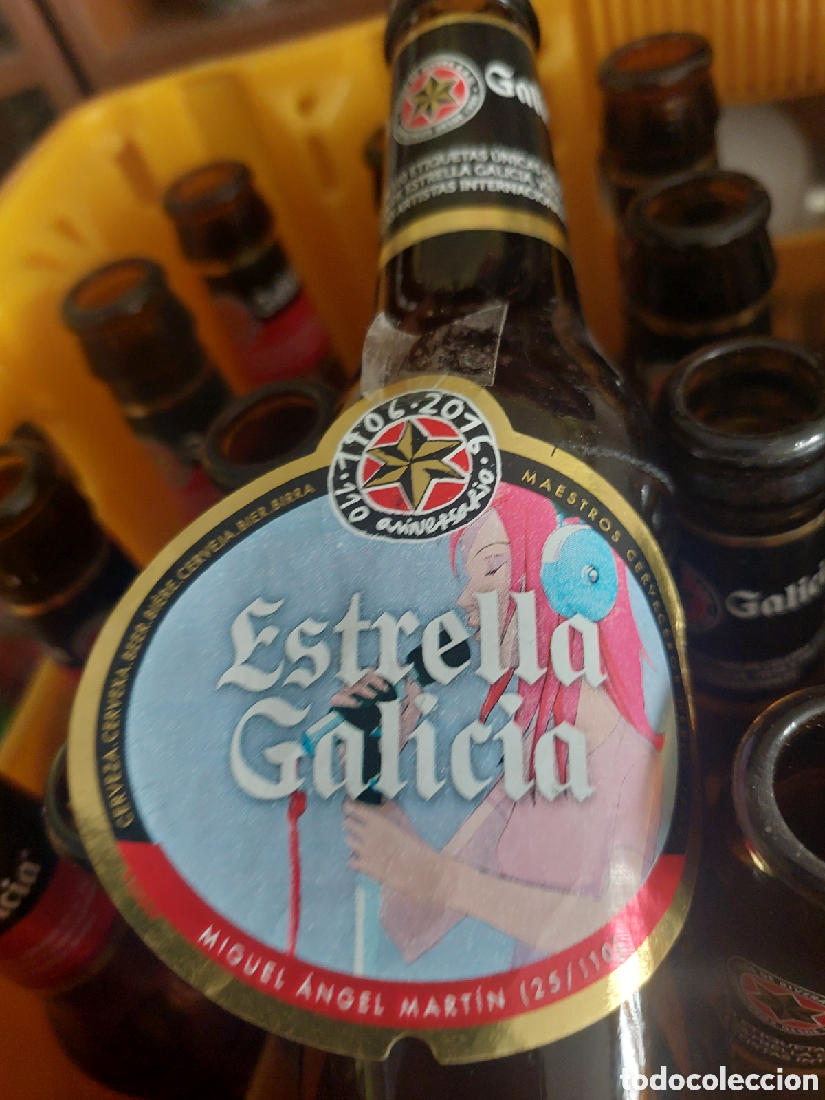 Coleccionismo de cervezas: 25/110 MIGUEL ANGEL MARTIN ARTE ESTRELLA GALICIA VACIA