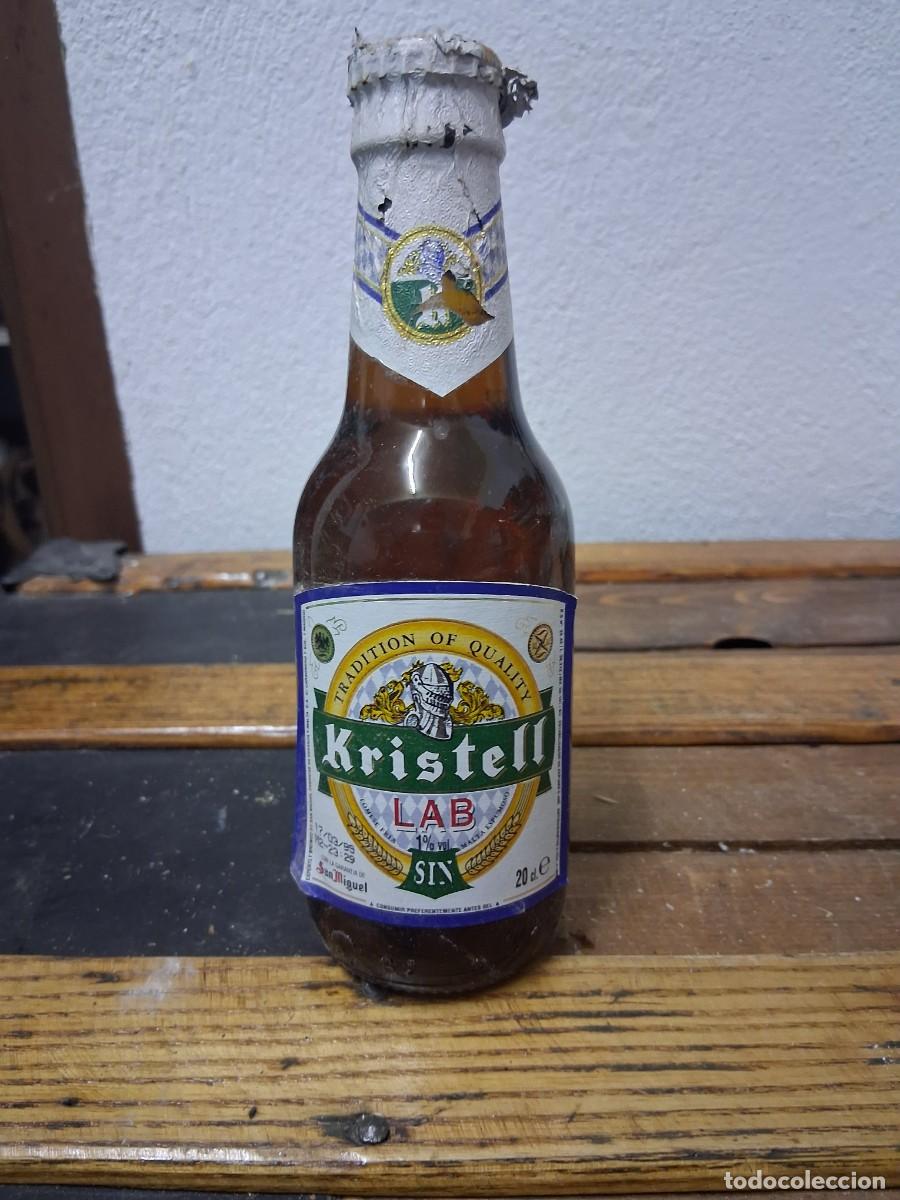 Coleccionismo de cervezas: Botella llena sin abrir con Chapa etiqueta Kristell LAB quinto San Miguel