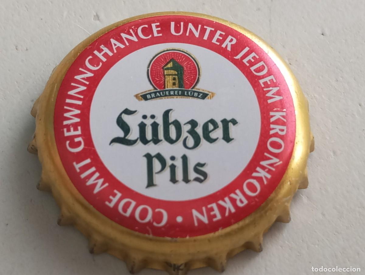 Coleccionismo de cervezas: Chapa tap&oacute;n corona de la cerveza alemana L&Uuml;BZER PILS CODE MIT GEWINNCHANCE UNTER JEDEM KRONKORKEN