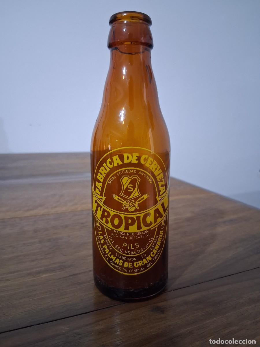 Coleccionismo de cervezas: Botella cerveza La tropical Las palmas de Gran Canaria SICAL quinto