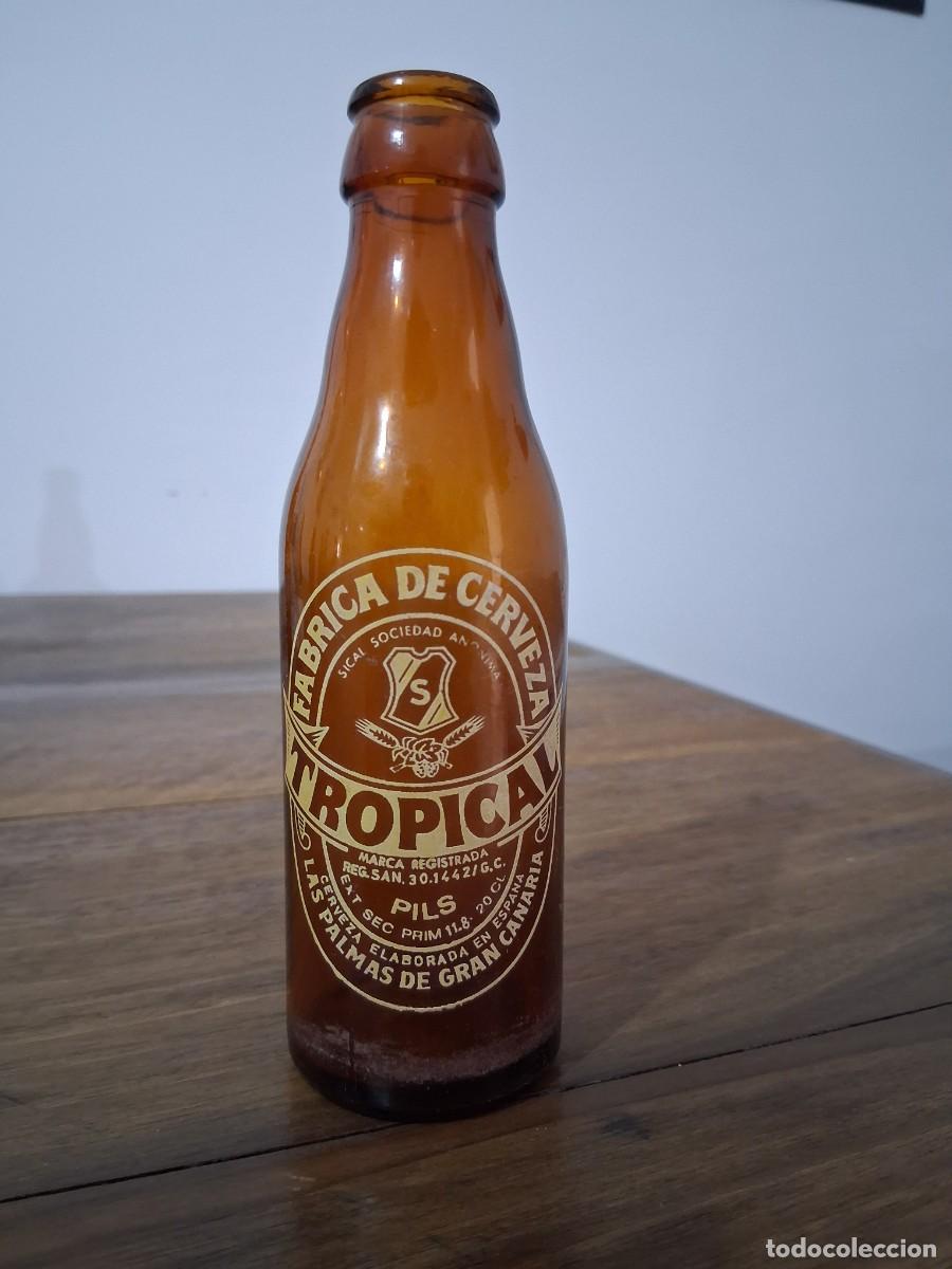 Coleccionismo de cervezas: Botella cerveza La tropical Las palmas de Gran Canaria SICAL quinto