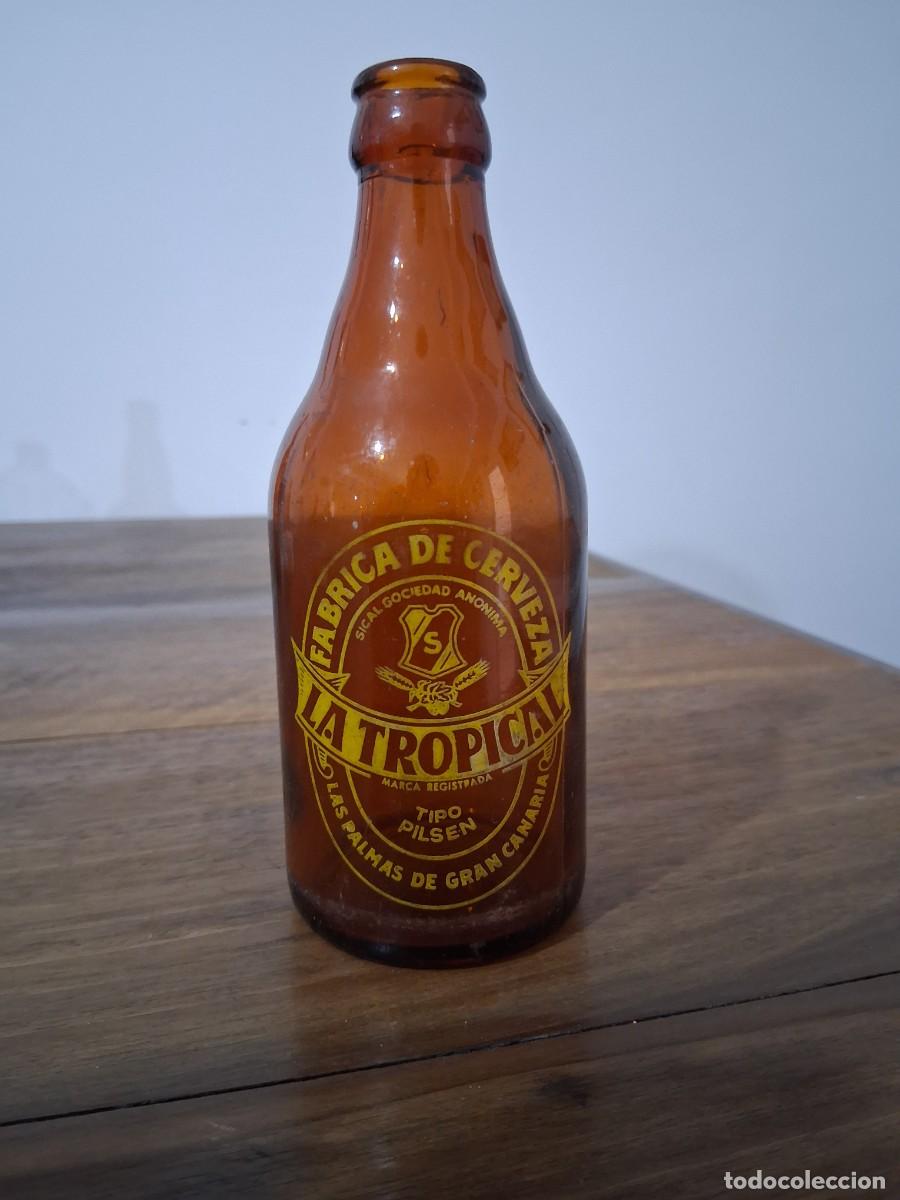 Coleccionismo de cervezas: Botella cerveza La tropical Las palmas de Gran Canaria SICAL tercio
