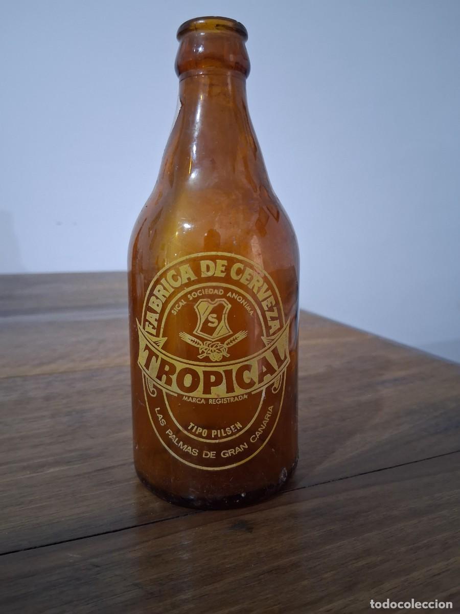 Coleccionismo de cervezas: Botella cerveza La tropical Las palmas de Gran Canaria SICAL tercio