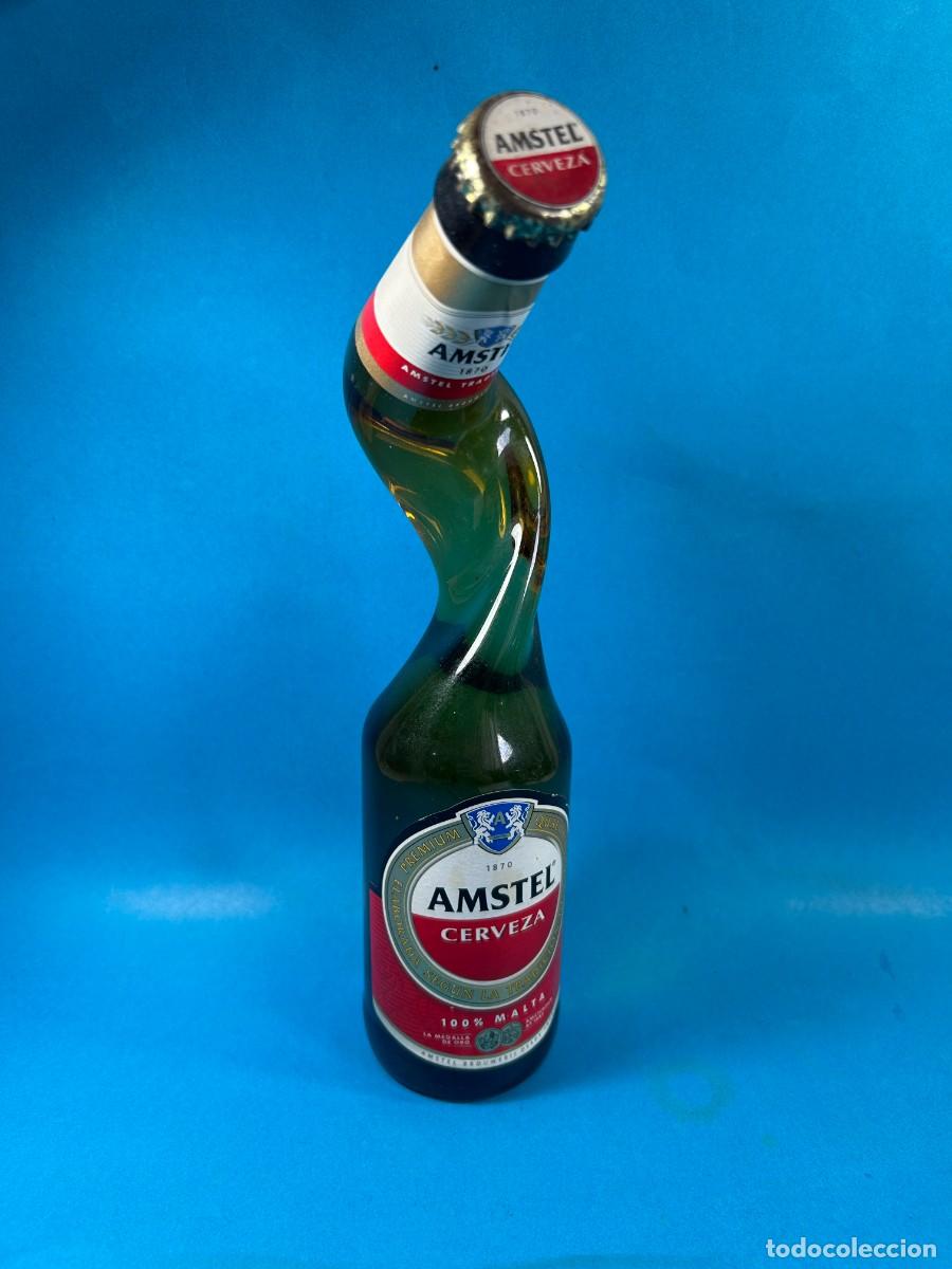 Coleccionismo de cervezas: BOTELLA CERVEZA AMSTEL CON CUELLO TORCIDO