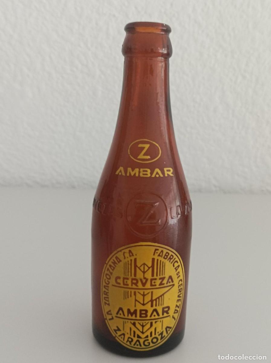 Coleccionismo de cervezas: Botella de cerveza ambar peque&ntilde;a-Leer-