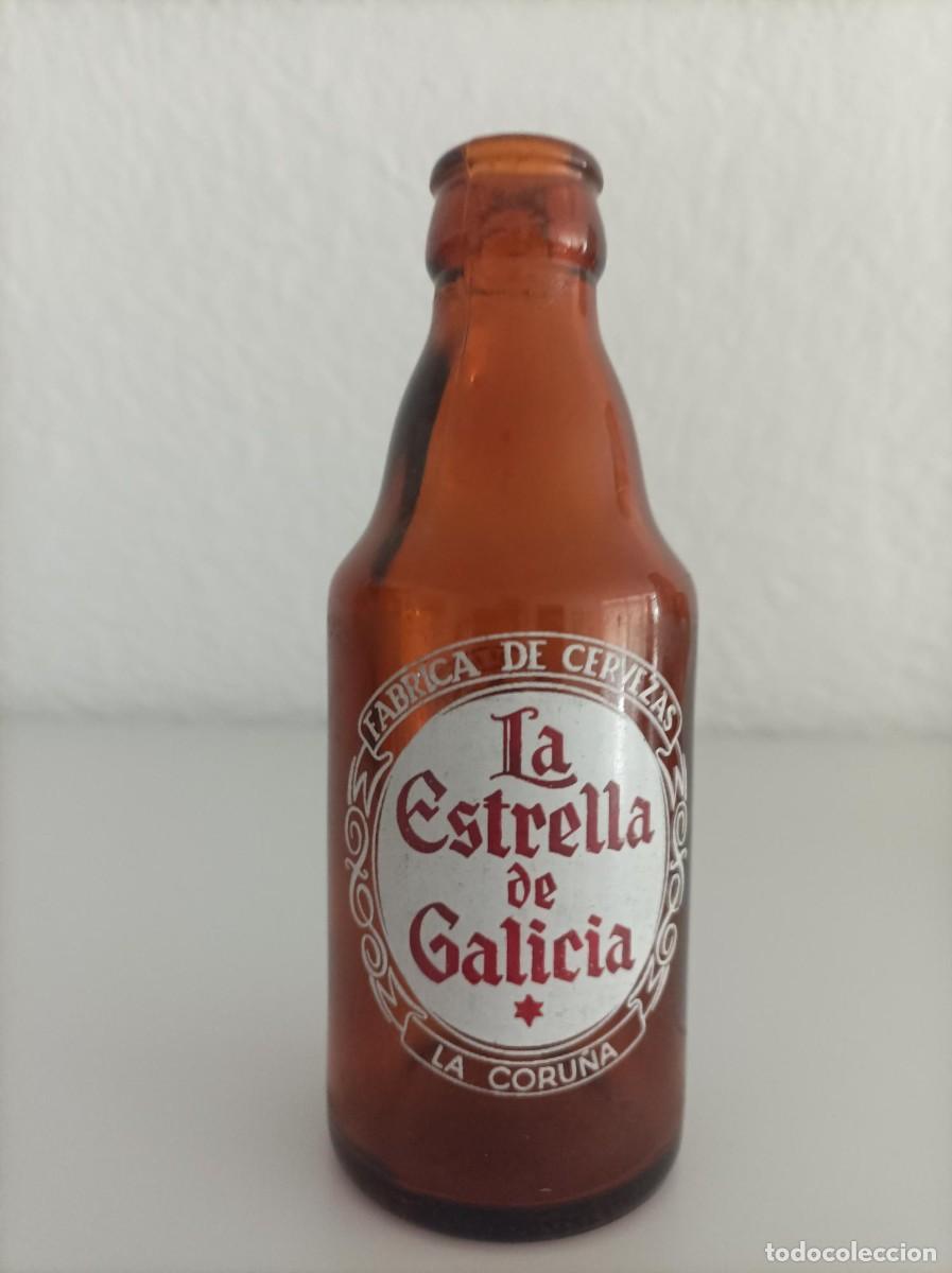 Coleccionismo de cervezas: Botellin de cerveza La estrella de Galicia-Leer-