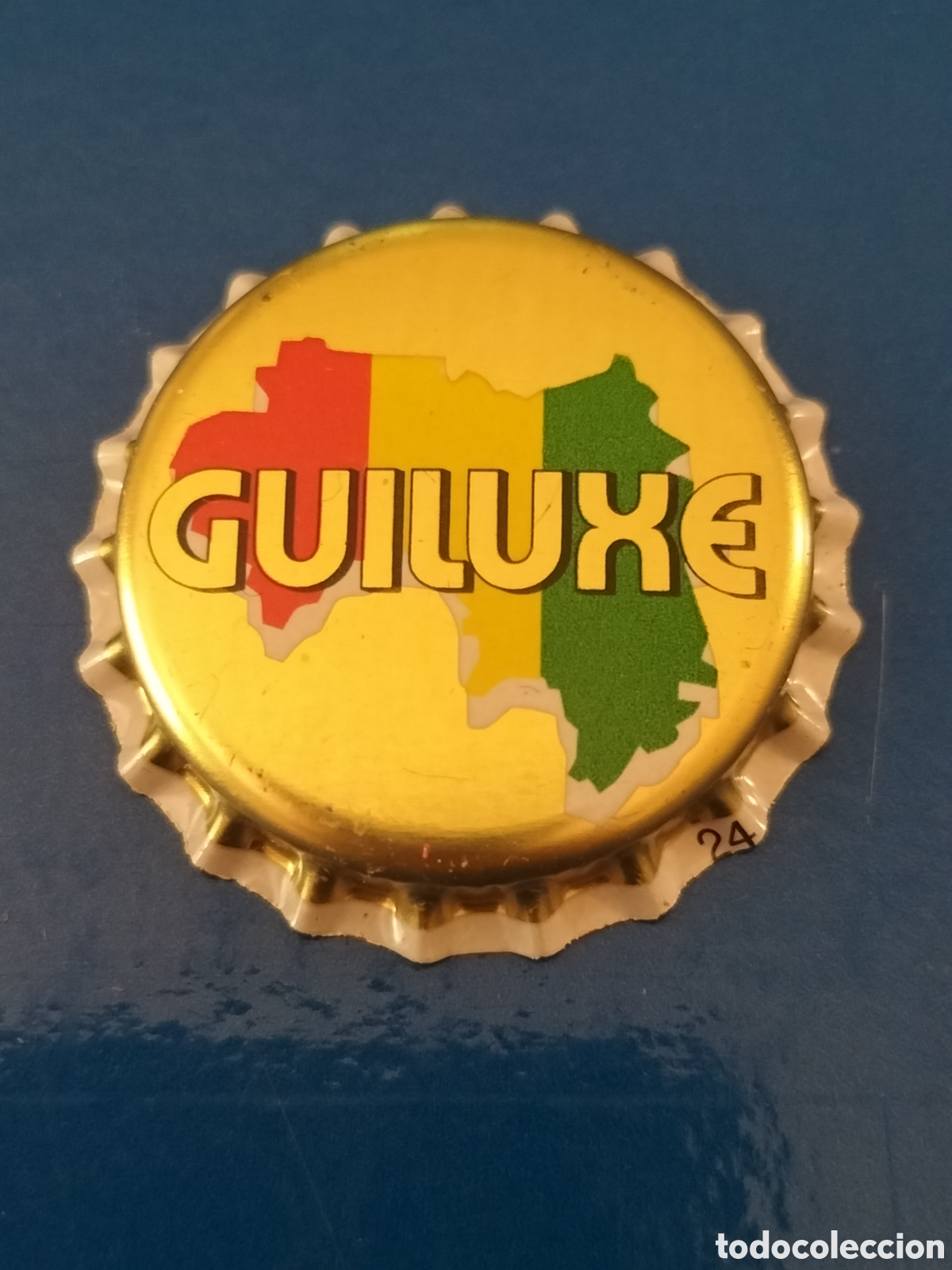 Coleccionismo de cervezas: CHAPA CERVEZA TAP&Oacute;N CORONA GUILUXE - GUINEA - NUEVA SIN USAR