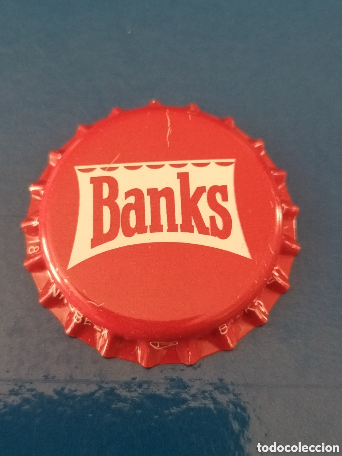 Coleccionismo de cervezas: CHAPA TAP&Oacute;N CORONA CERVEZA BANKS - GUYANA - NUEVA SIN USAR