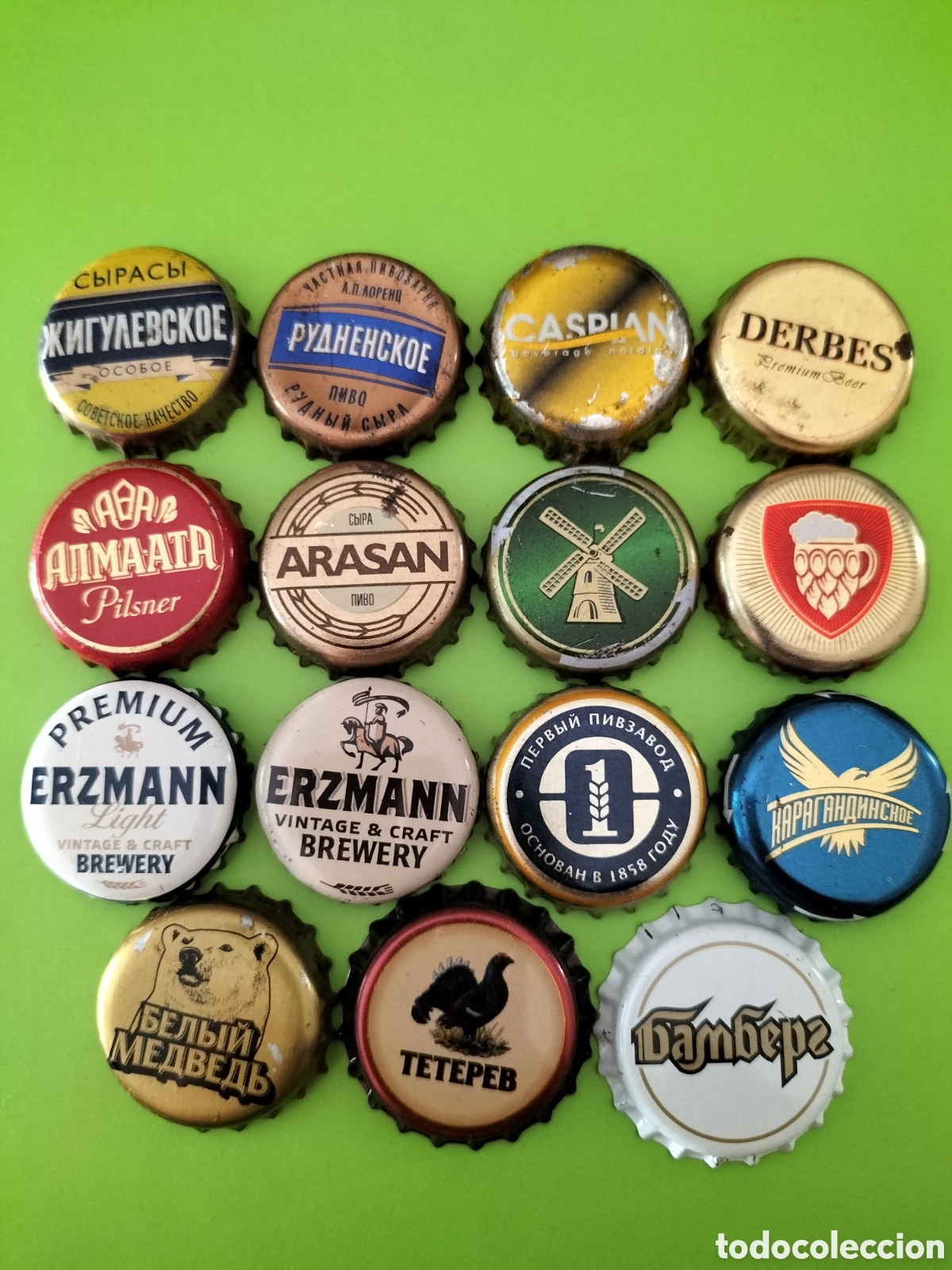 Coleccionismo de cervezas: LOTE 15 CHAPAS TAPON CORONA CERVEZA - KAZAJIST&Aacute;N