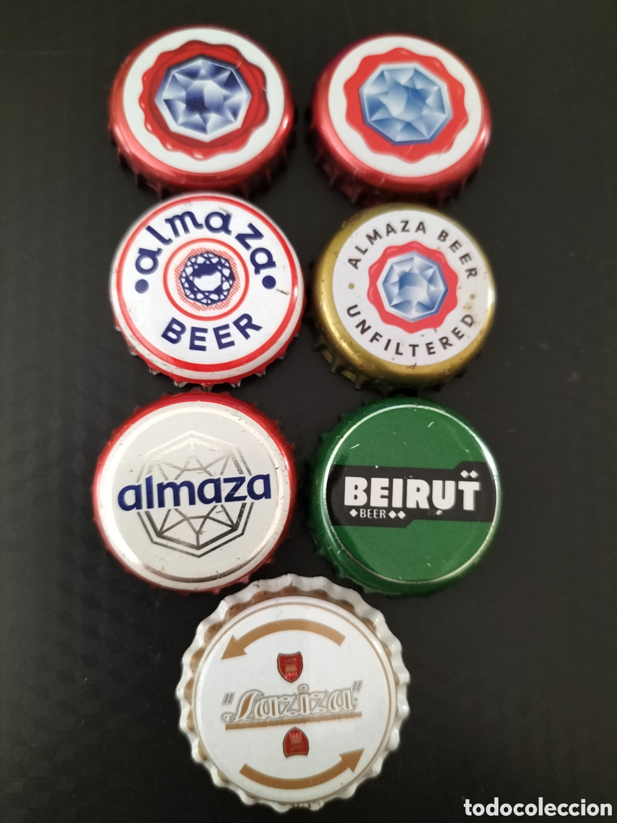 Coleccionismo de cervezas: LOTE 7 CHAPAS TAPON CORONA CERVEZA - L&Iacute;BANO