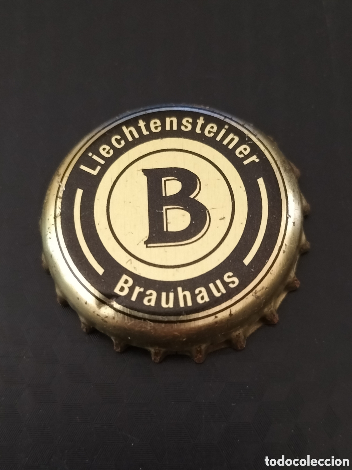 Coleccionismo de cervezas: CHAPA TAP&Oacute;N CORONA CERVEZA - LIECHTENSTEIN