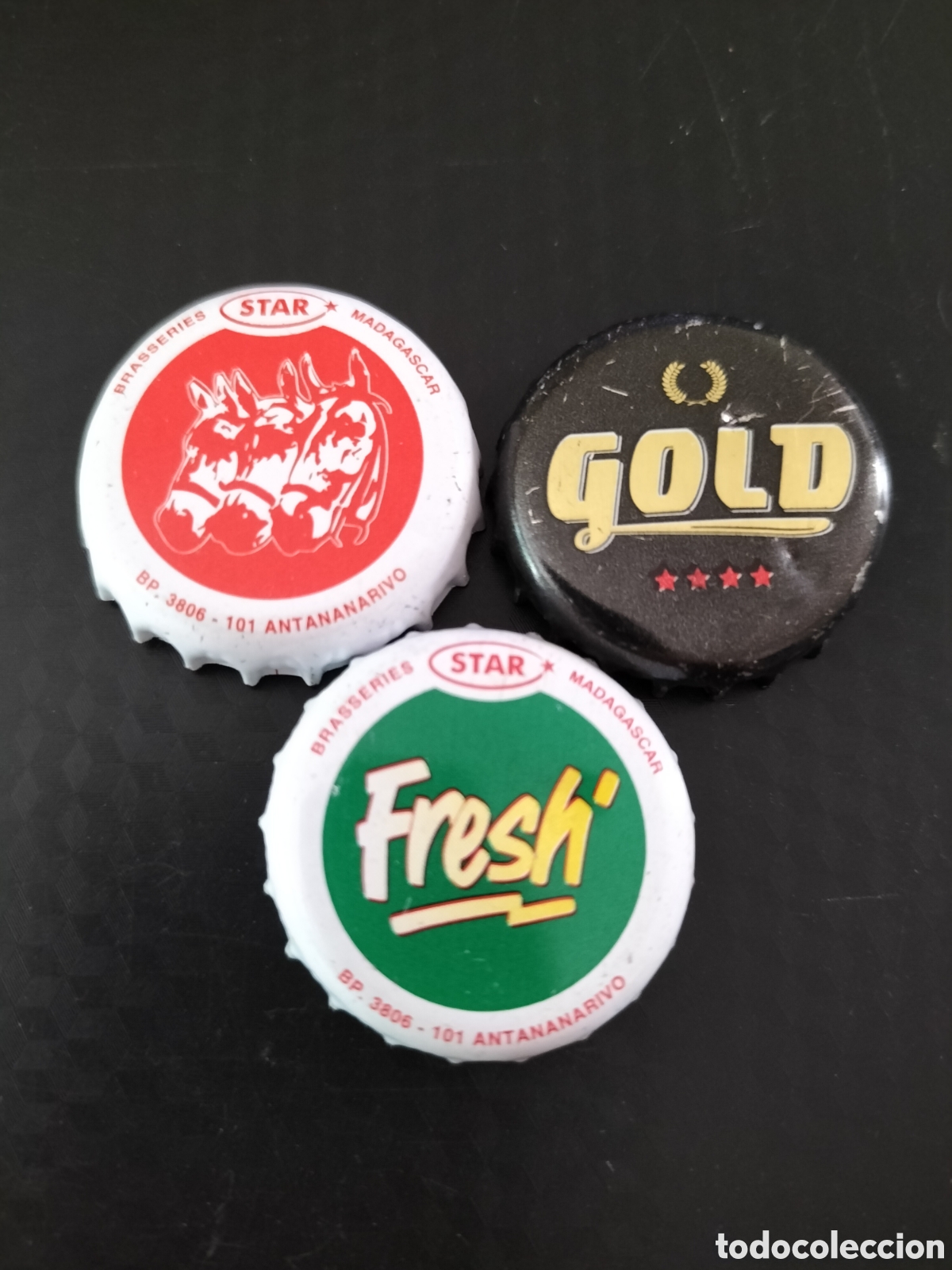 Coleccionismo de cervezas: LOTE 3 CHAPAS TAPON CORONA CERVEZA - MADAGASCAR