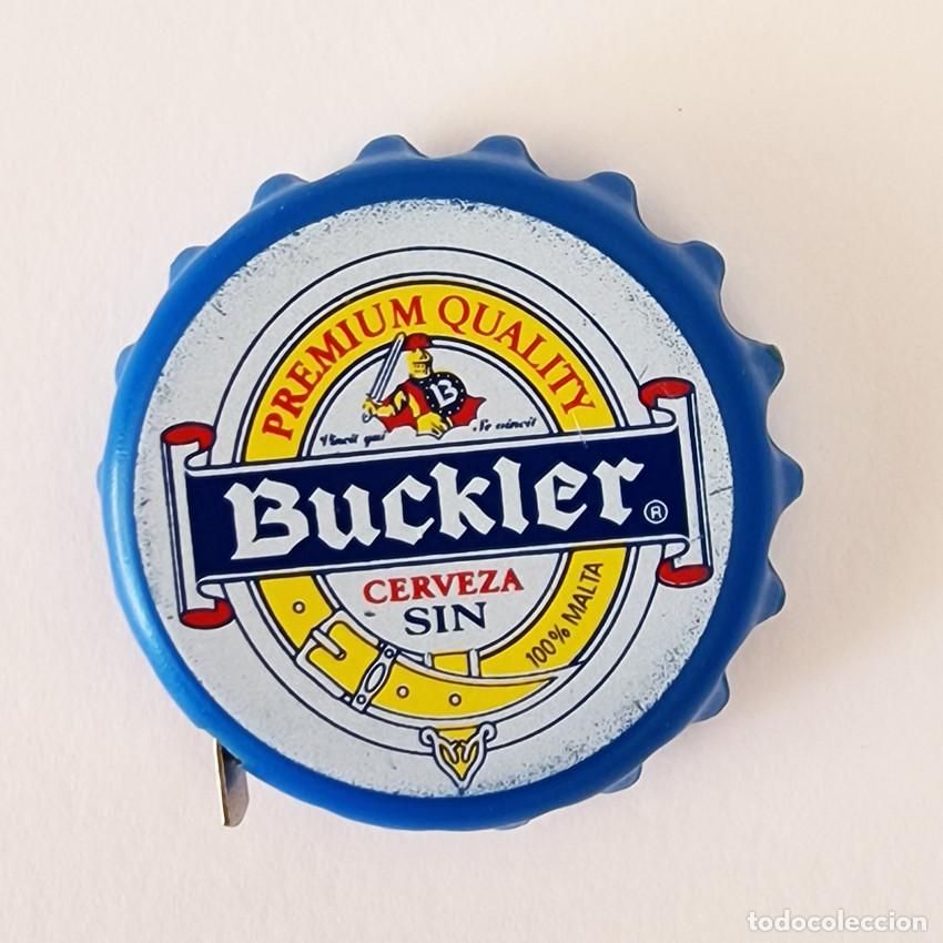 Coleccionismo de cervezas: CINTA METRICA BUCKLER Cerveza Sin Forma de CHAPA Tap&oacute;n Corona Merchandising BAR Vintage Colecci&oacute;n