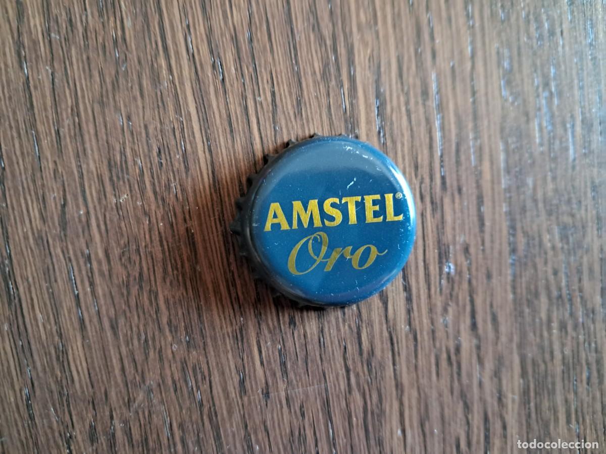 Coleccionismo de cervezas: chapa tap&oacute;n corona de cerveza, amstel oro.